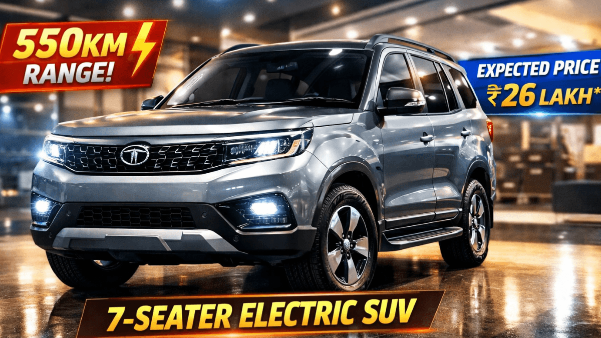 Showroom display image of Tata Safari Storme 2026 EV concept in metallic silver finish, highlighting bold SUV design, LED headlights, 550KM claimed range, expected ₹26 lakh price tag, and premium 7-seater electric SUV styling.