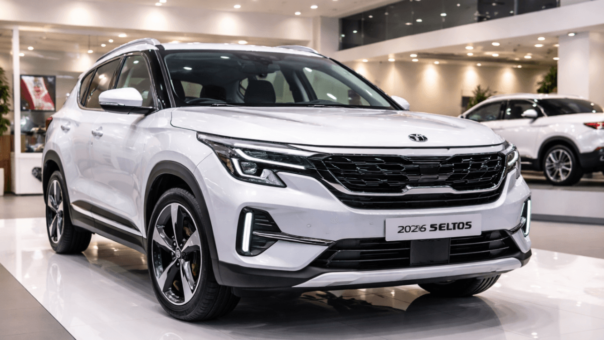  A sleek white 2026 Kia Seltos displayed inside a modern car showroom, angled slightly from the side to show its front grille, LED headlights, and sporty design
