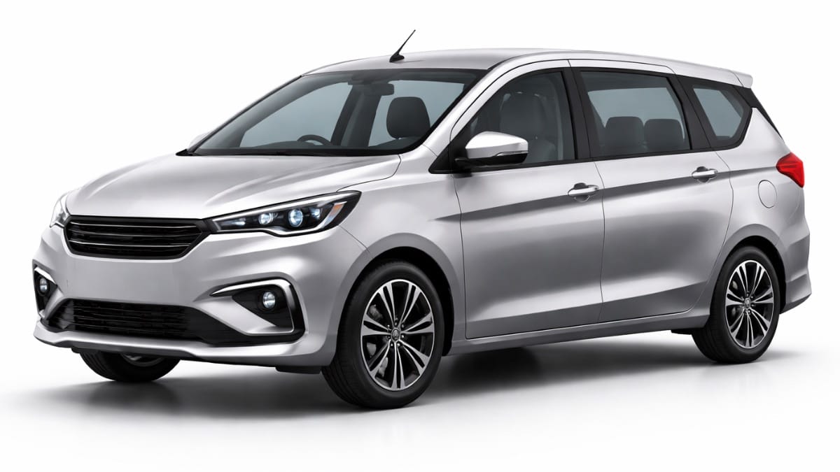 2026 Maruti Ertiga Hybrid price India silver MPV car white background front view
